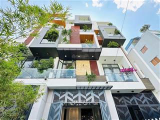 Cho thuê nhà mới  đường xe hơi đậu đỗ  sát phan xích long  4x20m 4 lầu