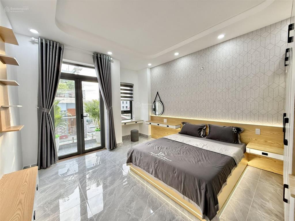 Siêu phẩm 4m x 18m. 4 tầng ô thang máy. 1/ hẻm 8m thông đường trung mỹ tây 09