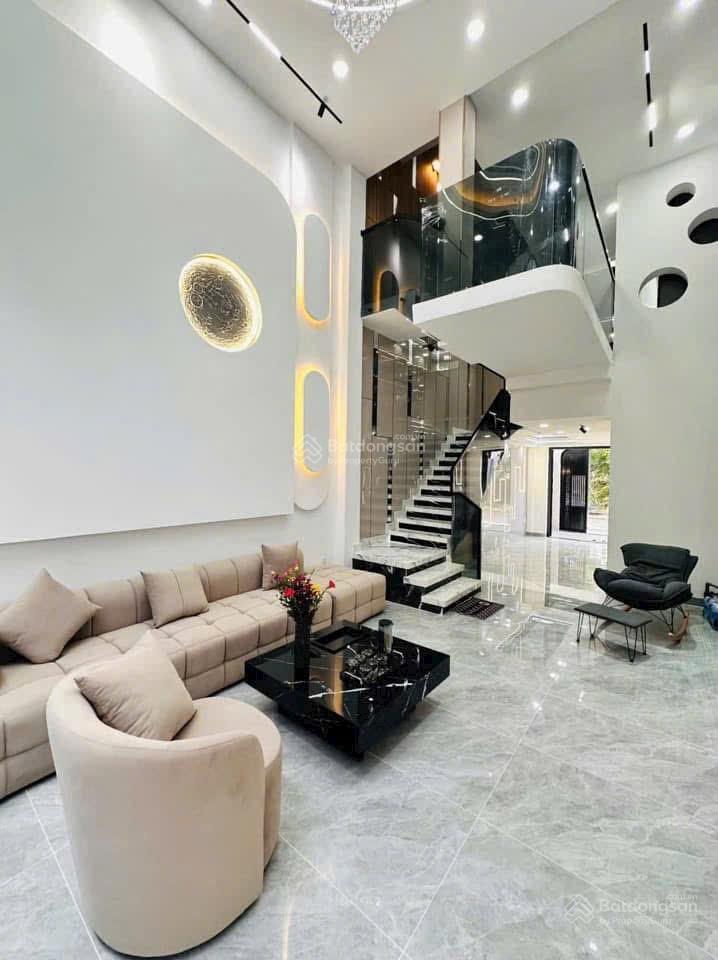 Bán nhà mới xây 1 trệt, lửng, 3 lầu 70m2 đường 12m nhà có chiều dài an phú đông chỉ 7 tỷ hơn