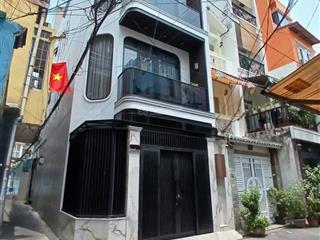 Nhà rất đẹp, nở hậu hxh huỳnh văn bánh, 5 tầng, thang máy, dòng tiền 55 triệu/tháng, chỉ 16,5 tỷ tl