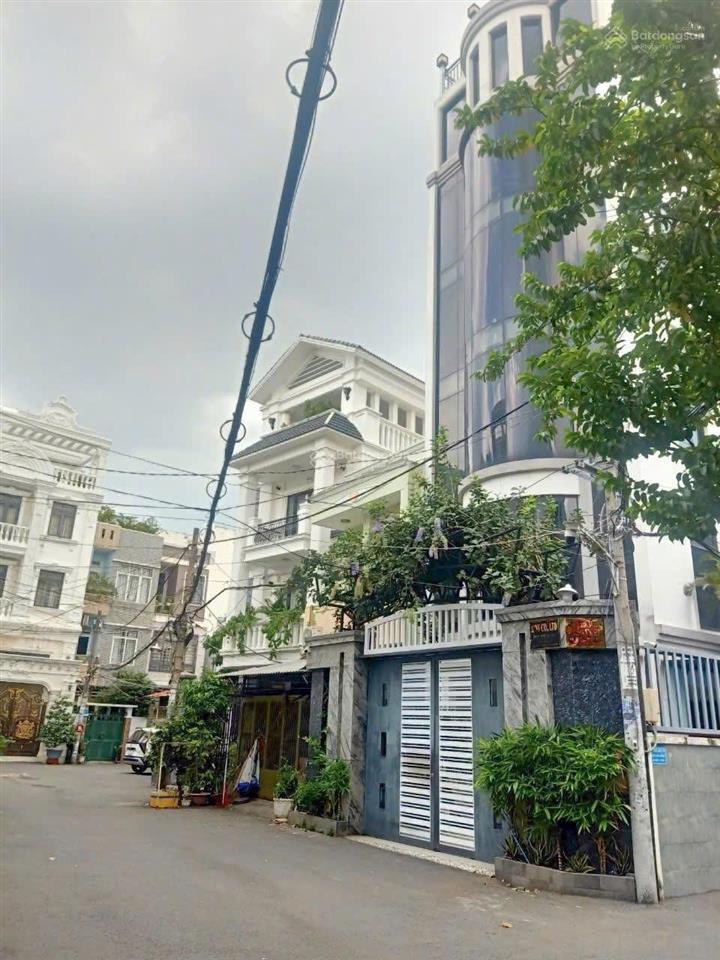 Bán tòa nhà vp góc 2 mặt tiền nguyễn thái sơn, p.4, gò vấp dt 8x26m 6 tầng thang máy