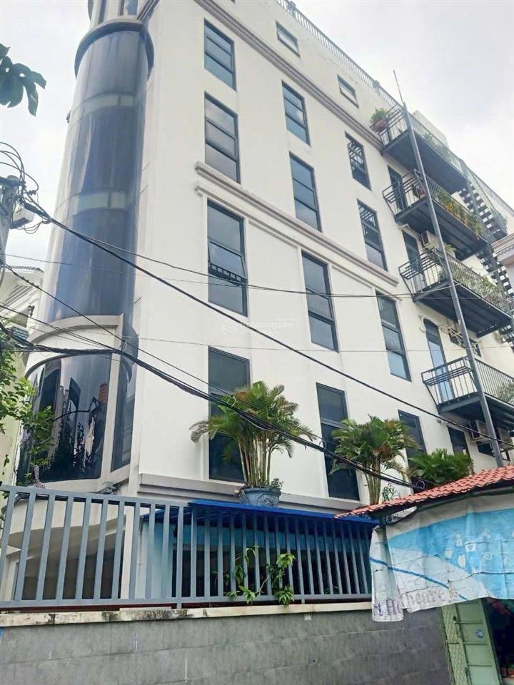 Bán tòa nhà vp góc 2 mặt tiền nguyễn thái sơn, p.4, gò vấp dt 8x26m 6 tầng thang máy