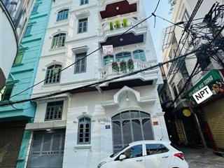 Bán nhà lô góc phố pháo đài láng  ô tô ngủ nhà  dt 50m2 x 5 tầng  mt 8.8m  giá 20,5 tỷ.