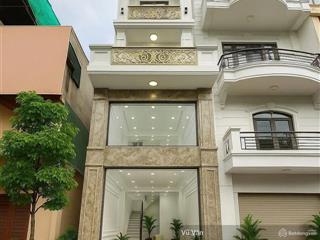 Bán nhà mp thông sàn nguyễn văn cừ mt 4m,  61m2,7 tầng thang máy, nở hậu, 2 thoáng, 33.5 tỷ
