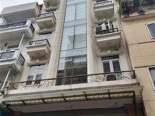 Bán tòa nhà văn phòng phố nguyễn khang, 100m2 x 8 tầng + 1 hầm thang máy, mt 7,4m giá 52 tỷ