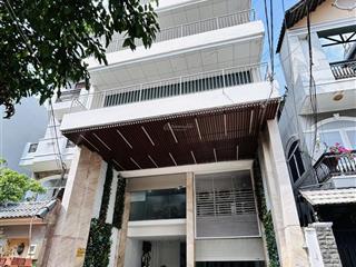 Tòa nhà đường nhánh khu trần não 7x25m hầm trệt 4 lầu cho thuê