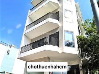 Tòa nhà 2 mặt tiền khu k300 dt 7x19m hầm trệt 4 lầu cho thuê