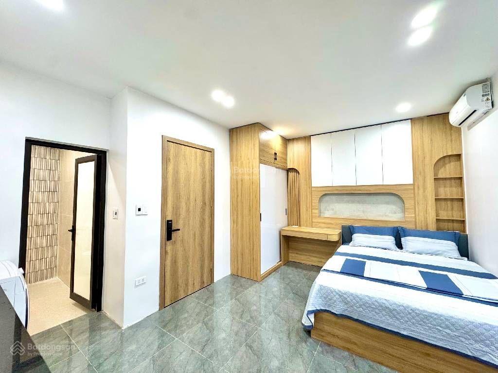 Phân lô 6 tầng thang máy sát phố lê thanh nghị 5 phòng ngủ lô góc 3 thoáng