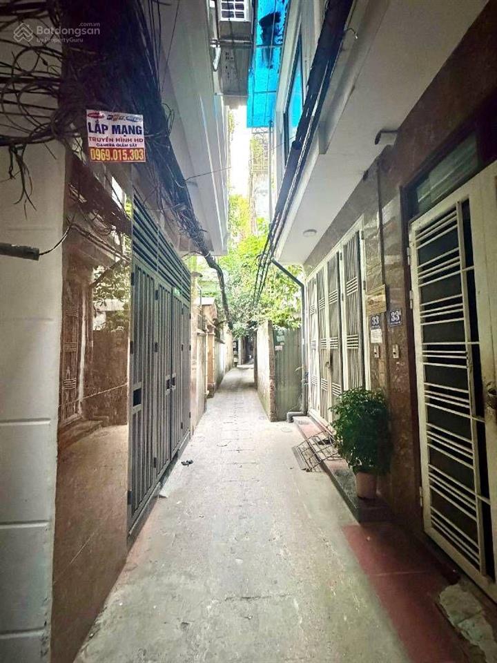 Phân lô 6 tầng thang máy sát phố lê thanh nghị 5 phòng ngủ lô góc 3 thoáng