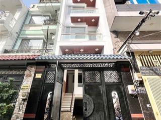 5tầng  hầm để xe  hẻm 8m  nhà mới vào ở liền  hẻm thông an ninh  427 lê văn quới