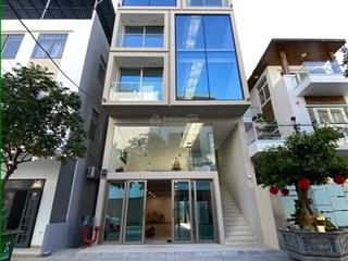 Tòa nhà văn phòng 7 tầng mới 100% an trung 4  gần cầu rồng  3 mặt thoáng  dòng tiền 800 tr/năm