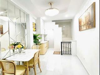 Hơn 7 tỷ  nhà đẹp vương thừa vũ  ngõ thông ở ngay  6 tầng khung cột bê tông chắc chắn