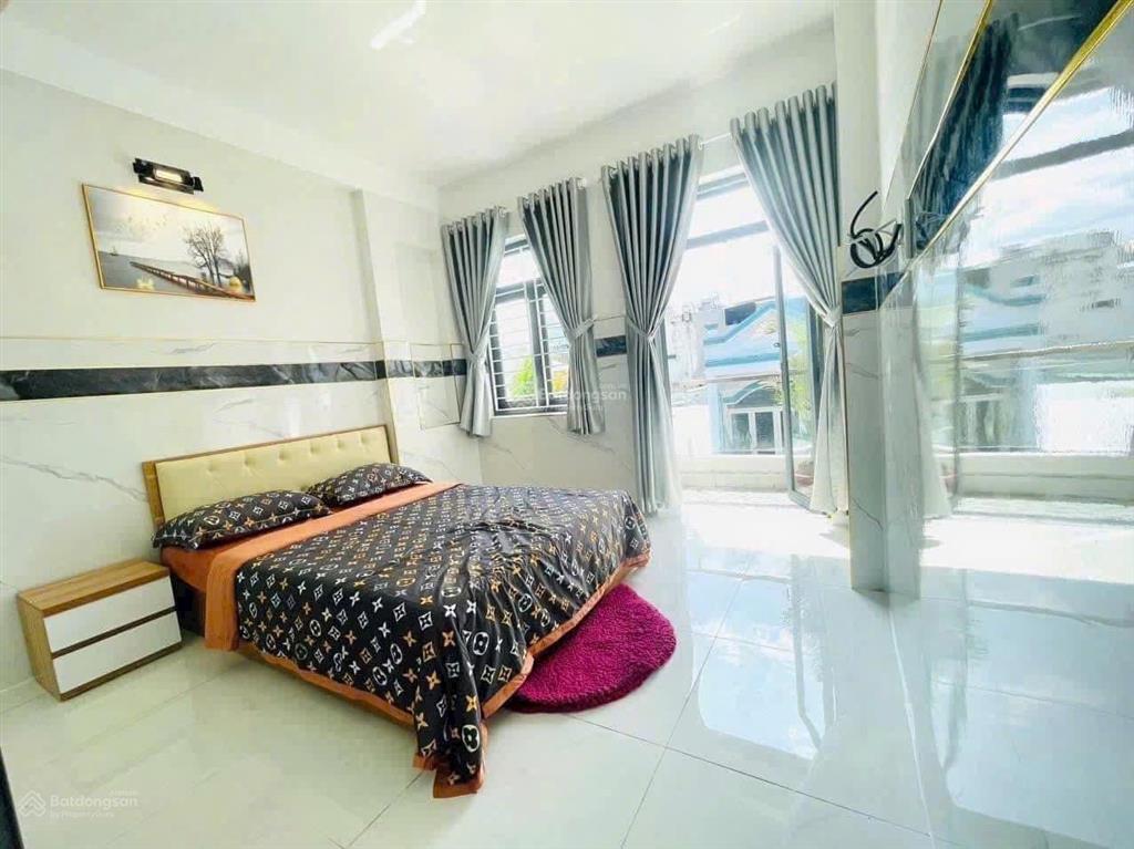 Bán nhà mặt tiền 3 lầu kd đa ngành toạ lạc gần ngay chợ tân sơn