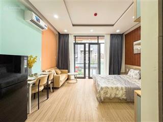 Chdv 5 tầng  13 phòng  xe hơi tránh 1 trục  sát mặt tiền