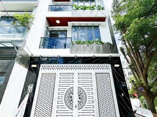 Hot. bán nhà phố mới xây 5x14m  4 tầng  gara oto  9tỷ2  giáp q7 1km