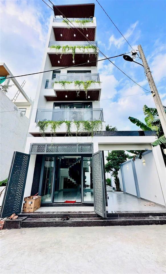 Nhà mới diện tích biệt thự 4 pn, sân xe hơi rộng rãi đường an phú đông 27, đh nguyễn tất thành