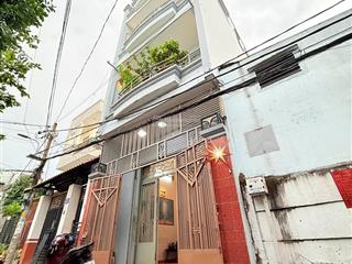Nhà 4,5mx10m ngay sát phạm văn đồng + lê quang định hẻm xe hơi