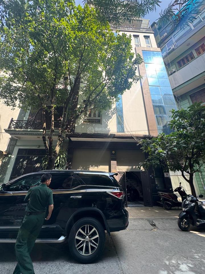 Building vừa ở vừa dòng tiền  hoàng quốc việt 7 tầng thang máy  3 mặt thoáng, 2 ô tô tránh kd