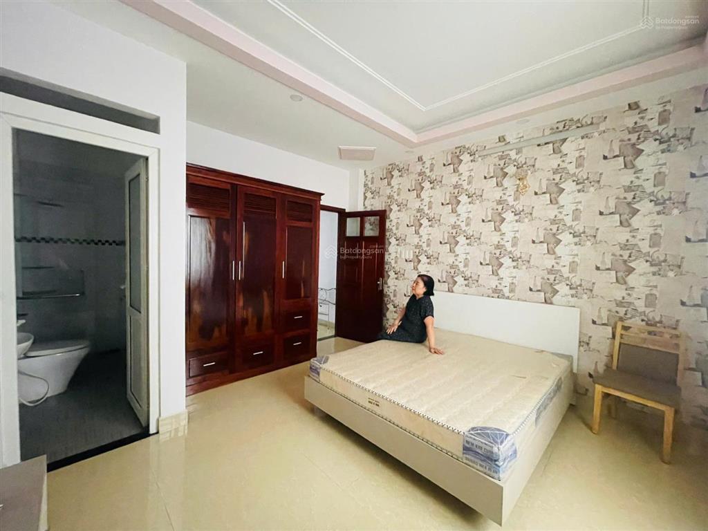 Bán nhà mặt tiền nguyễn văn đậu hầm 5 tầng, 8 phòng, thang máy, full nội thất,4.5x18m giá 22.9tỷ tl