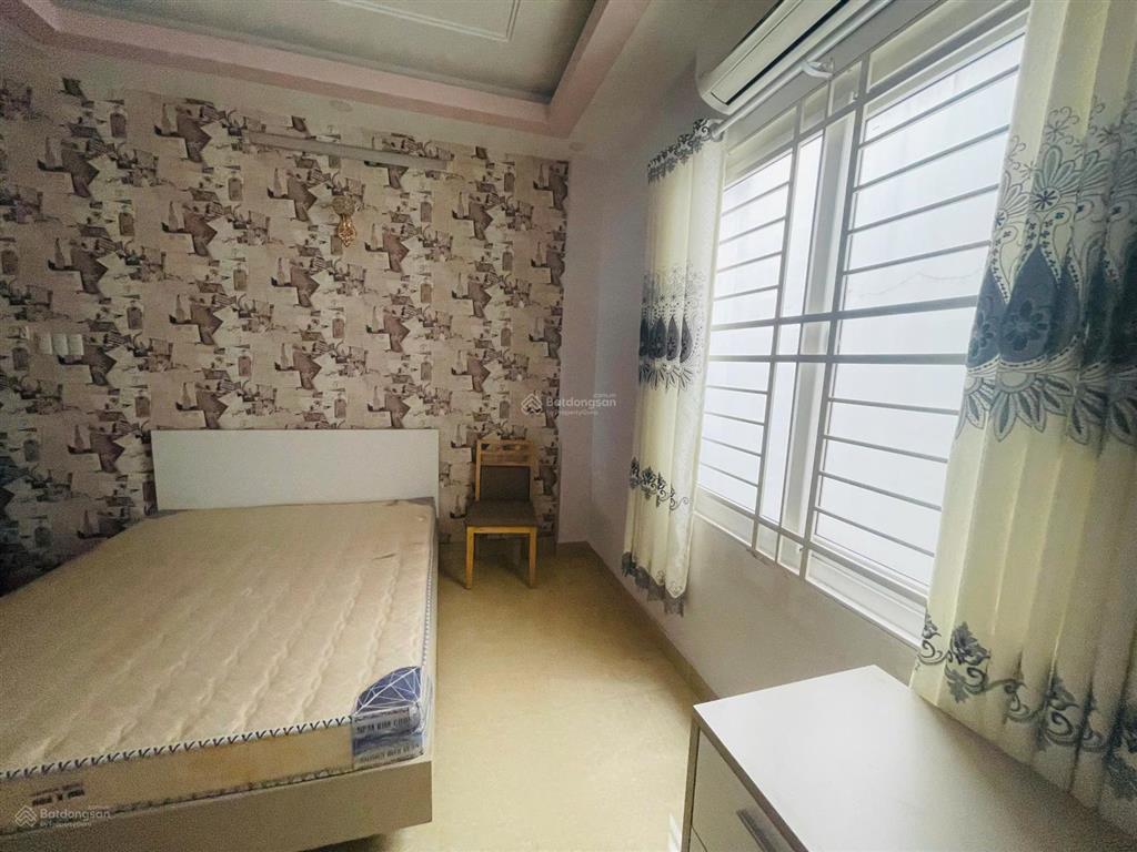 Bán nhà mặt tiền nguyễn văn đậu hầm 5 tầng, 8 phòng, thang máy, full nội thất,4.5x18m giá 22.9tỷ tl