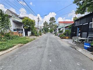 Bán đất tân bình dĩ an dt 100m2 đường huỳnh thị xuân vào chỉ 150m full thổ cư, sổ hồng riêng.