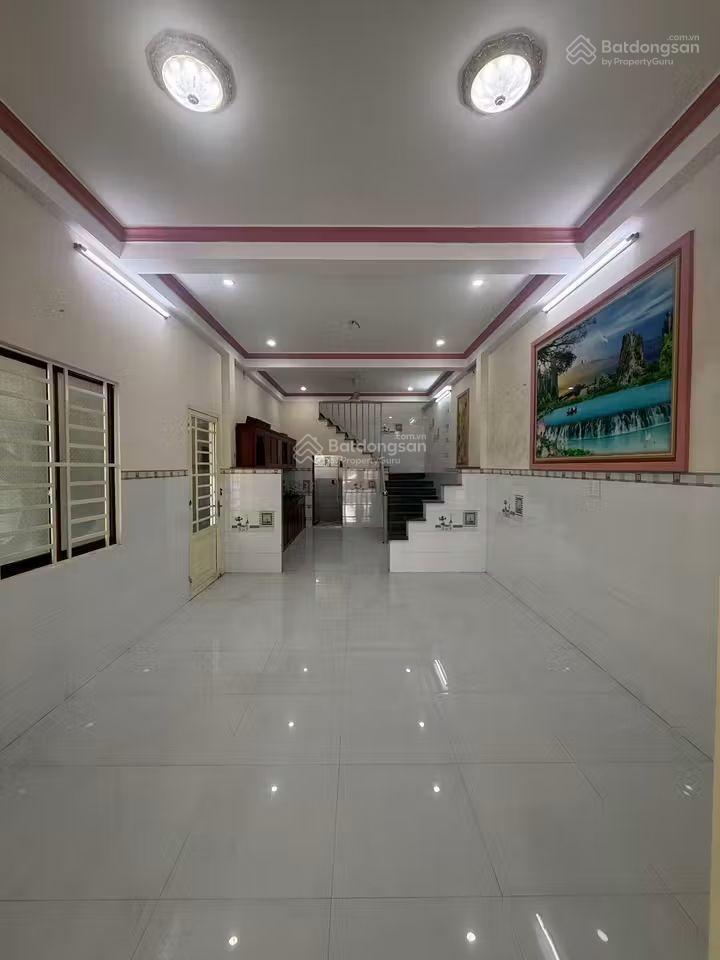 Chính chủ gửi bán căn nhà lầu và 3p trọ tại khu tái định cư mỹ phước 3 (khu g) dt 150m2 sổ sẵn