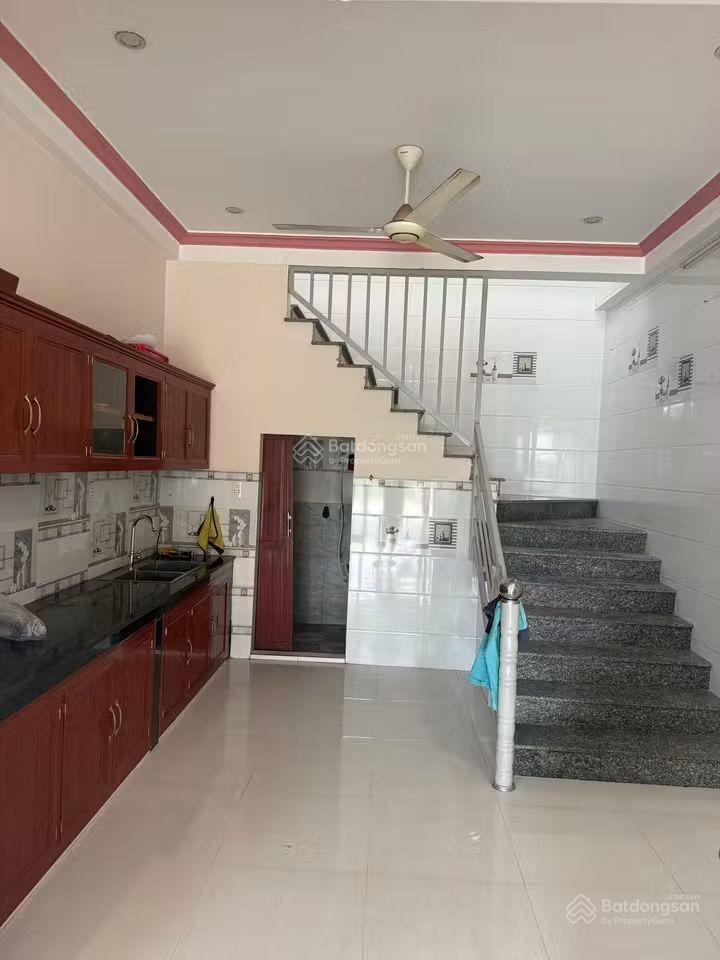 Chính chủ gửi bán căn nhà lầu và 3p trọ tại khu tái định cư mỹ phước 3 (khu g) dt 150m2 sổ sẵn