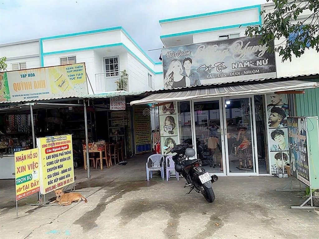 Bán căn nhà trọ mặt tiền đường nhựa 22,5m kinh doanh tốt dt 140m2 gồm 1kiot 4phòng thu nhập 8tr shr