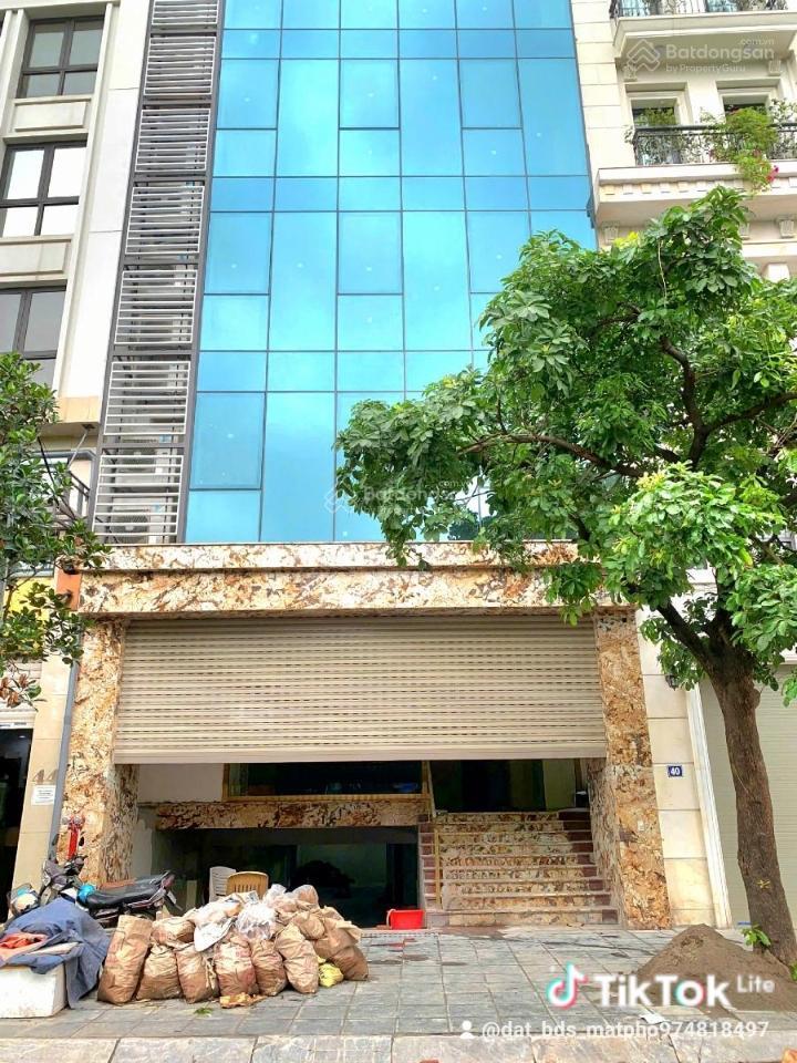 Trung tâm tây hồ toà nhà 9 tầng mặt tiền rộng ô tô tránh vi trí đẹp kinh doanh tốt .