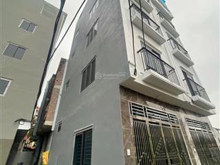 Cần bán nhà 5 tầng mới xây dt 31,6 m2 ( hướng nam) sổ hồng chính chủ