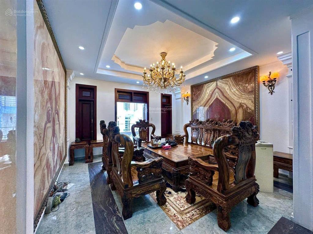 Bán nhà thang máy full nt gỗ quý 5x20m hầm 5 tầng đẹp  ngay siêu thị emart phan văn trị 16.5 tỷ