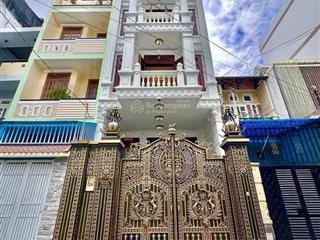 Bán nhà thang máy full nt gỗ quý 5x20m hầm 5 tầng đẹp  ngay siêu thị emart phan văn trị 16.5 tỷ