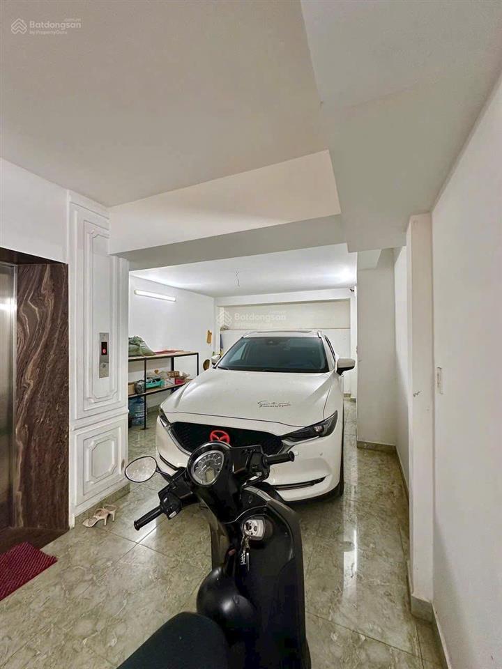 Bán nhà thang máy full nt gỗ quý 5x20m hầm 5 tầng đẹp  ngay siêu thị emart phan văn trị 16.5 tỷ