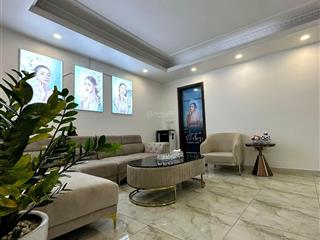 48 tỷ sở hữu tòa nhà mặt phố nguyễn khang 92m*7t mt5m  2 mặt tiền  vỉa hè đá bóng .