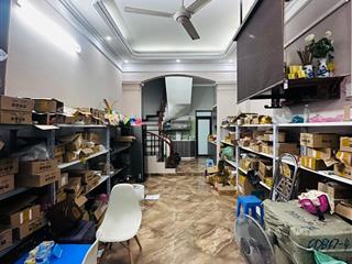 Nhà phân lô mạc thị bưởi  dt 55 m2  5 tầng  mt 4m  giá 10.5 tỷ. phân lô lô góc  kinh doanh