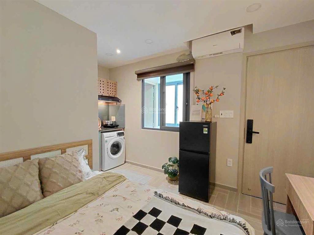 Phòng trọ 30m2 full nội thất,cửa sổ,máy giặt riêng, máy hút mùi tại phú nhuận, gần bình thạnh,q1,q3