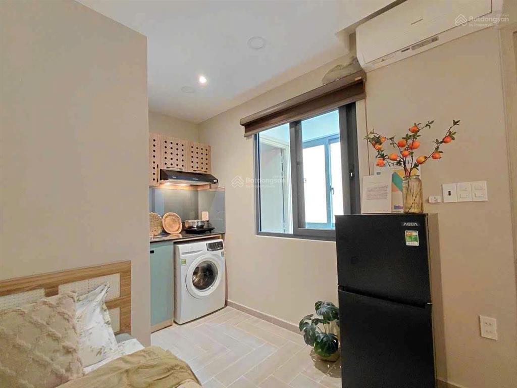 Phòng trọ 30m2 full nội thất,cửa sổ,máy giặt riêng, máy hút mùi tại phú nhuận, gần bình thạnh,q1,q3