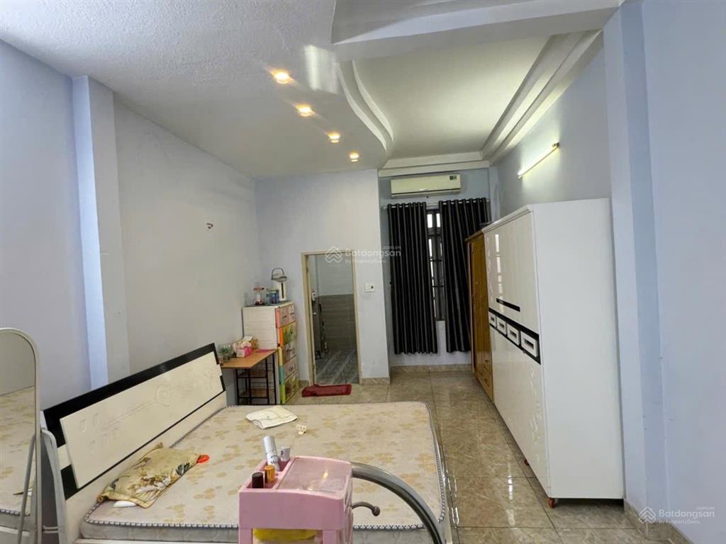 Bán nhà quang trung  1 trục hẻm xe hơi  cách mặt tiền 50m  4m x 22m  8,990 tỷ