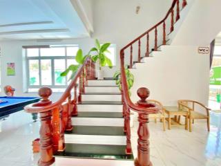 Bán nhà nghỉ khu bãi tắm thuỷ tiên  dt 400m (20x20m)  xây dựng 200m  15 phòng  giá 22 tỷ