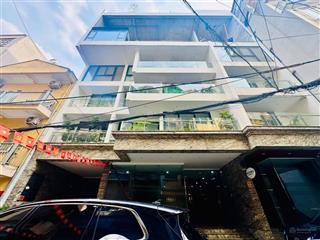 Mặt tiền 16m  building 8 tầng, 1 hầm, 2 thang máy  phố vip lạc long quân  2 mặt tiền trước sau