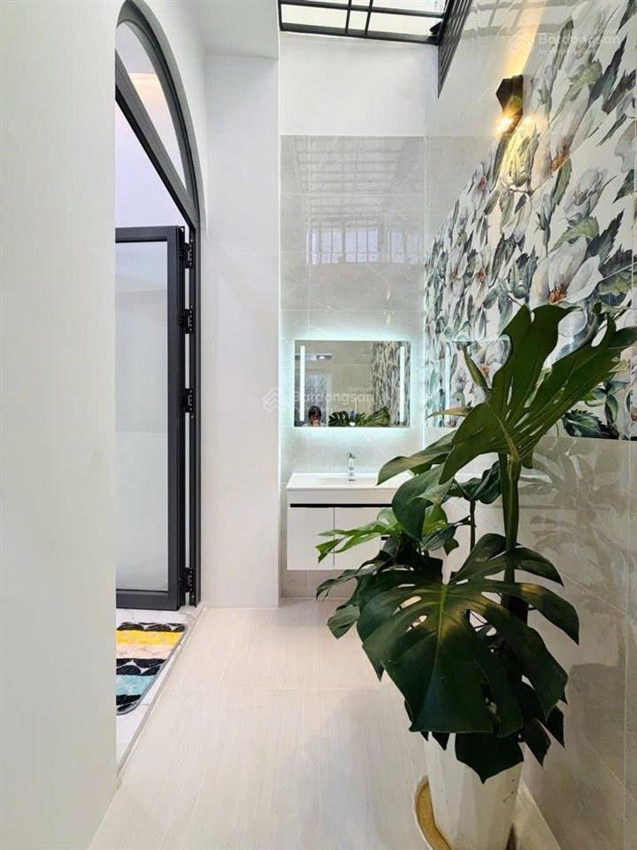 Bán nhà mặt tiền 3 tầng 100m2 ( 4,3 x 23,5) nguyễn duy cung p12 sổ hồng riêng