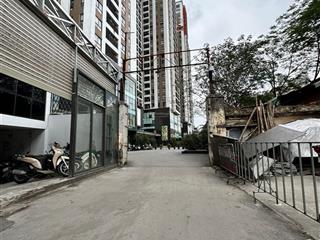 Tòa nhà văn phòng mới koong  9 tầng thang máy có hầm  ô tô tránh  2 mặt ngõ  gần ngã tư