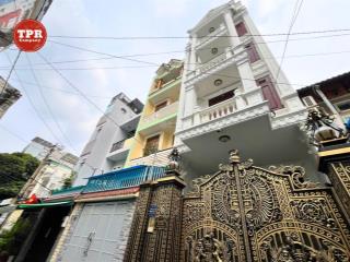 Nhà đẹp, hầm + 5 tầng phan văn trị, đối diện emart có thang máy, full nội thất cao cấp, p5, gv