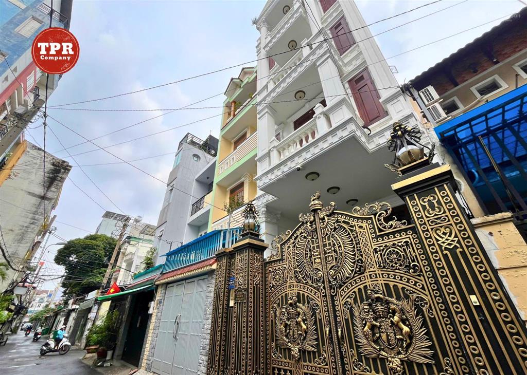 Nhà đẹp, hầm + 5 tầng phan văn trị, đối diện emart có thang máy, full nội thất cao cấp, p5, gv