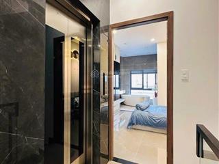 Nhà mặt tiền đường số  thang máy  nhà mới full nội thất, q7