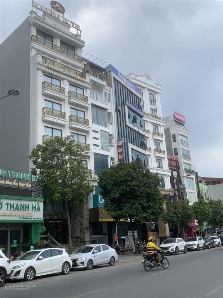 Bán gấp tòa vp đẹp nhất q.đống đa dt 410m2 xây 10 tầng 2 thang máy mt 11m đường đôi hè rộng có hầm