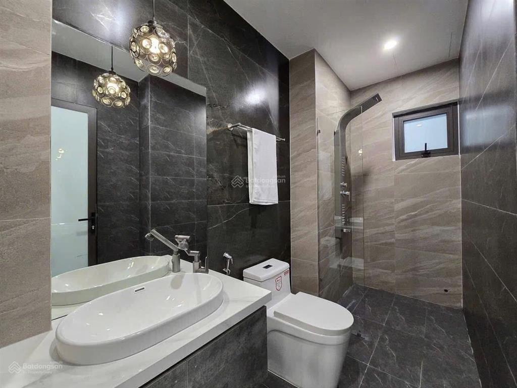 Bán toà nhà 28 phòng, 8 tầng, dt 115m2, mt 9,3m, có thang máy, mặt ngõ trích sài. giá 52 tỷ