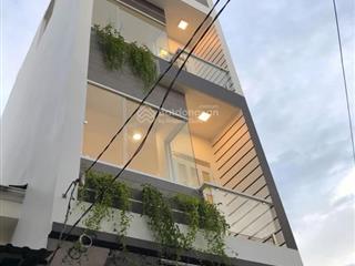 Nhà 1 trệt 3 lầu, ngay ql1k. cạnh go dĩ an