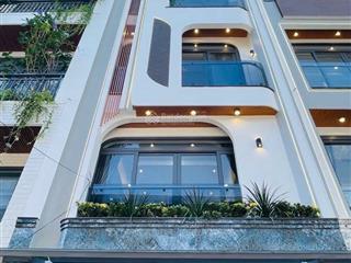 Siêu phẩm nhà 4 lầu thang máy, nội thất sang trọng, hxh 8m, gara ô tô, sổ đẹp