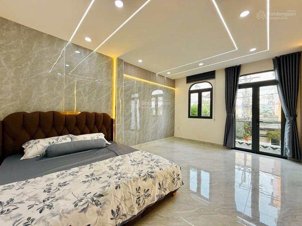 Mặt tiền đường sốkinh doanh buôn bán4x13m4 tầng có lửng5pn5wcxe hơi để trong nhà